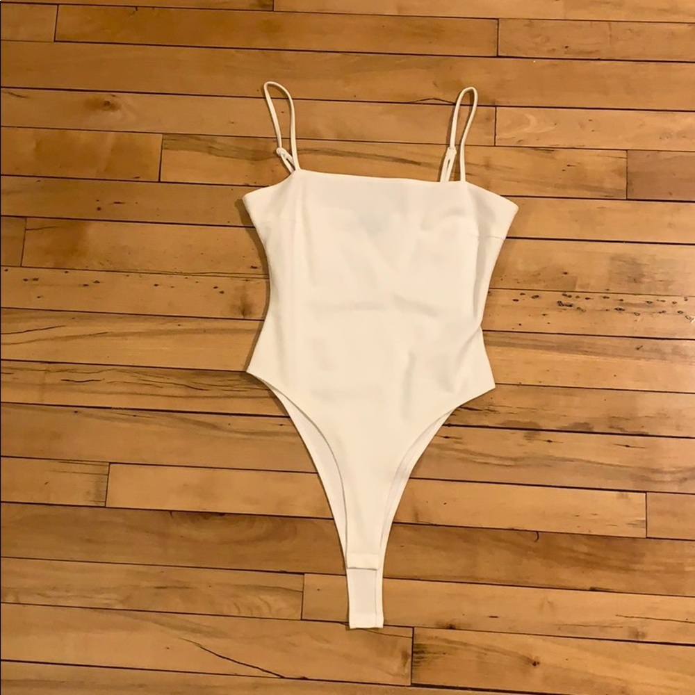 Off white bodysuit with adjustable strap